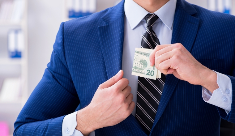 Businessman receiving his salary and bonus
