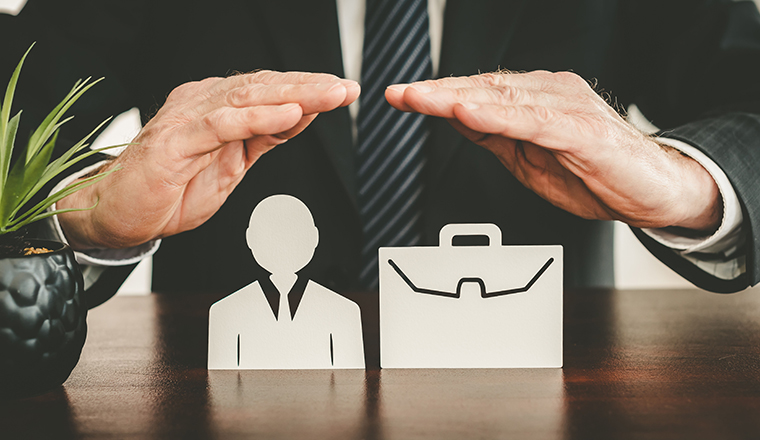 Insurer protecting an employee and a briefcase with his hands