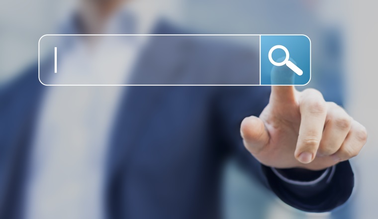Search button on virtual screen pressed with finger
