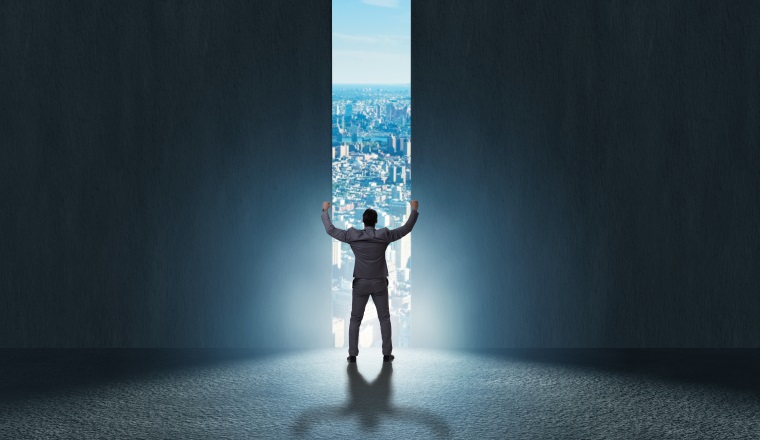 Businessman walking towards his ambition