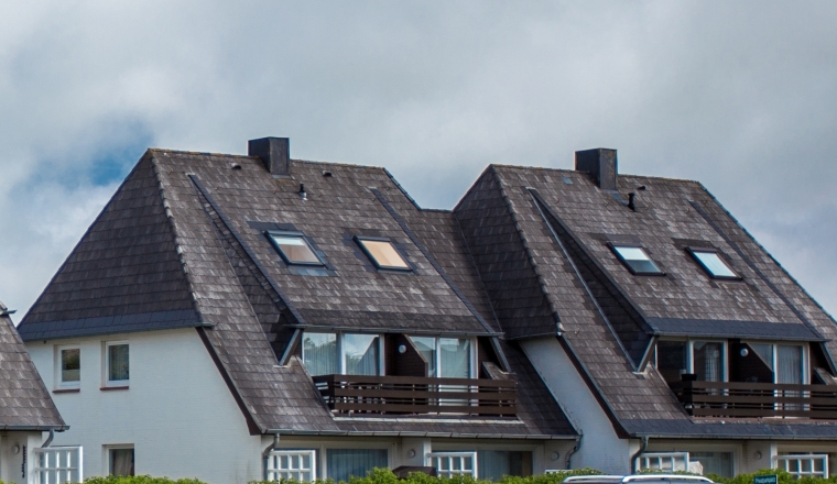  the roof of the house with nice window