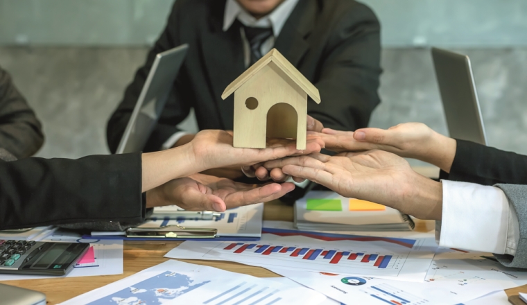 Working as a teamwork of real estate businesses.