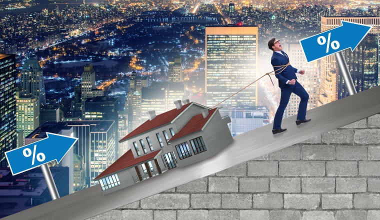 Businessman in mortgage debt financing concept
