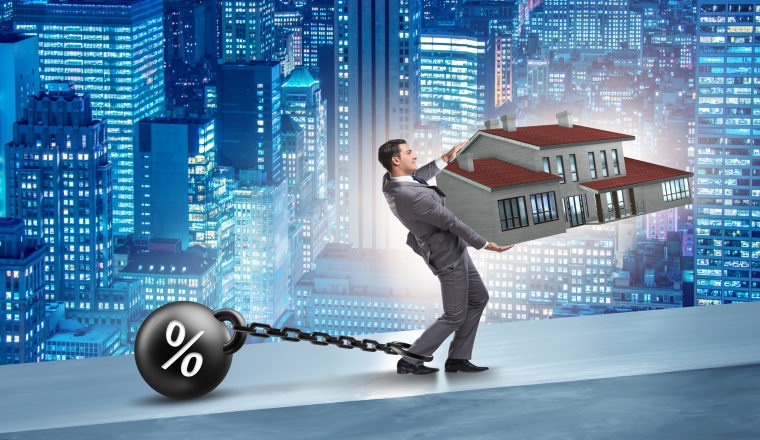 Businessman in mortgage debt financing concept