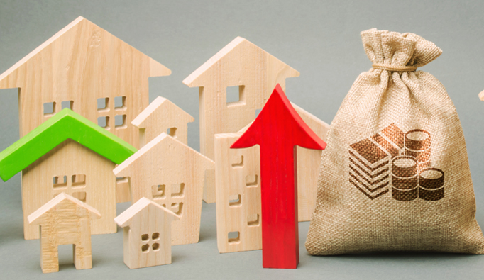 Red arrow up, money bag and miniature wooden houses. The concept of rising property prices. High mortgage rates. Expensive rental apartment. Growing demand for home purchase. Real estate market.