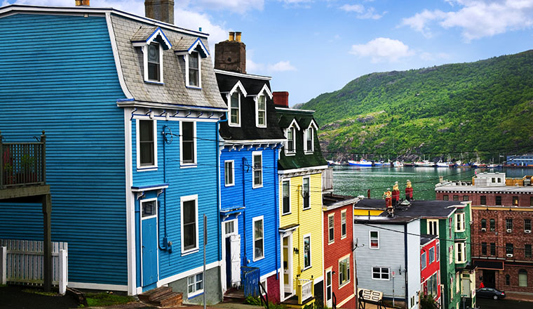 Street with colorful houses near ocean in St. John's, Newfoundland, Canada