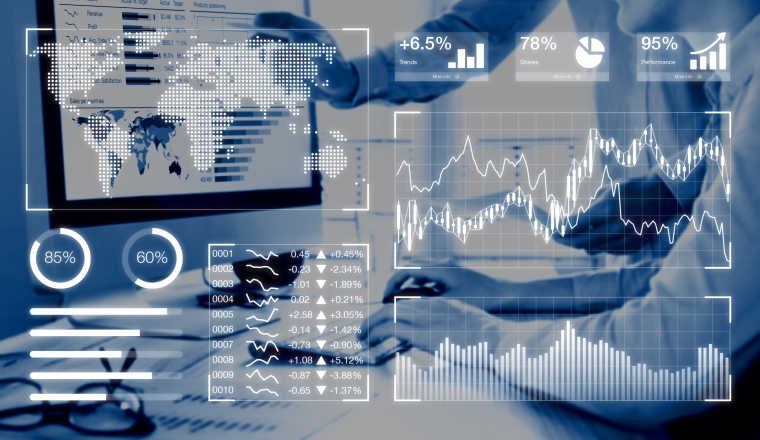 Business analytics dashboard reporting concept with key performance indicators (KPI) and two people analyzing sales or digital marketing data on computer screen in background