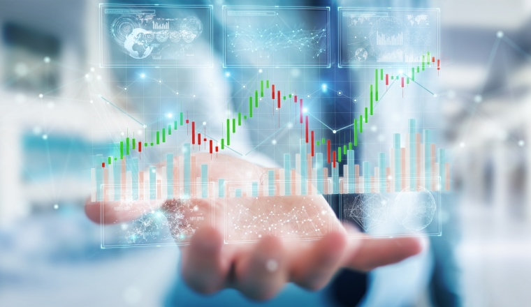 Businessman on blurred background using 3D rendering stock exchange datas and charts