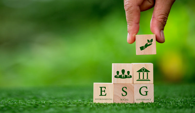 ESG concept of environmental, social and governance. words ESG on a wood cube is an idea for business sustainable organizational development. ​account the environment, society and corporate governance