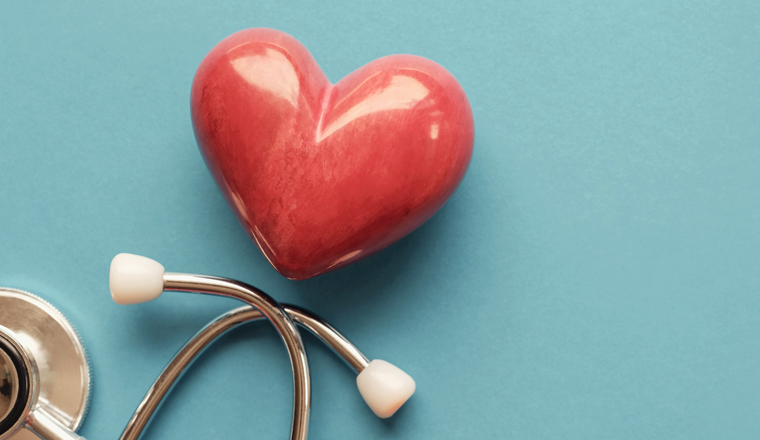 Red heart with stethoscope, heart health,  health insurance concept, World heart day, world health day