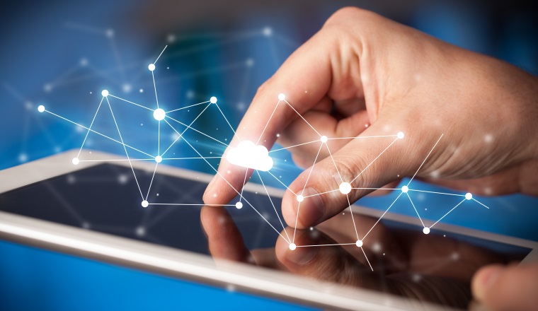 Female hands touching tablet with white cloud concept