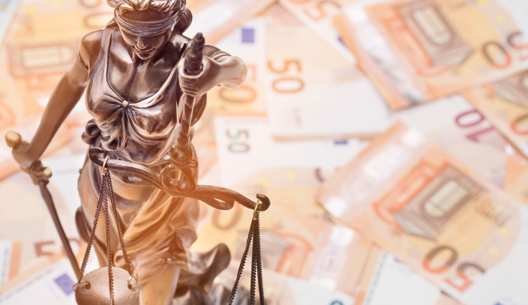 Lady Justice is on several 50 and 20 Euro bills. Concept photo for a lawsuit where a lot of money is at stake. 