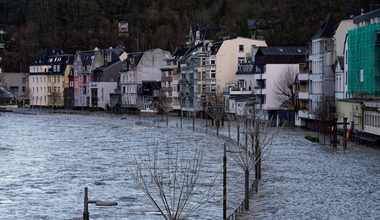 Flood river Lenne in Altena, Germany, street is flooded. First flood in 2023.