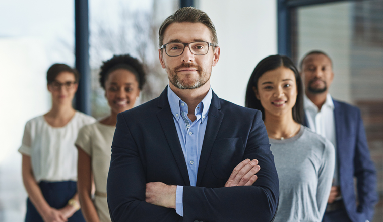 Team of smart and successful business people, leader or manager looking happy, satisfied or confident with their job, career and business. Face portrait of smart or ambitious corporate men and women.