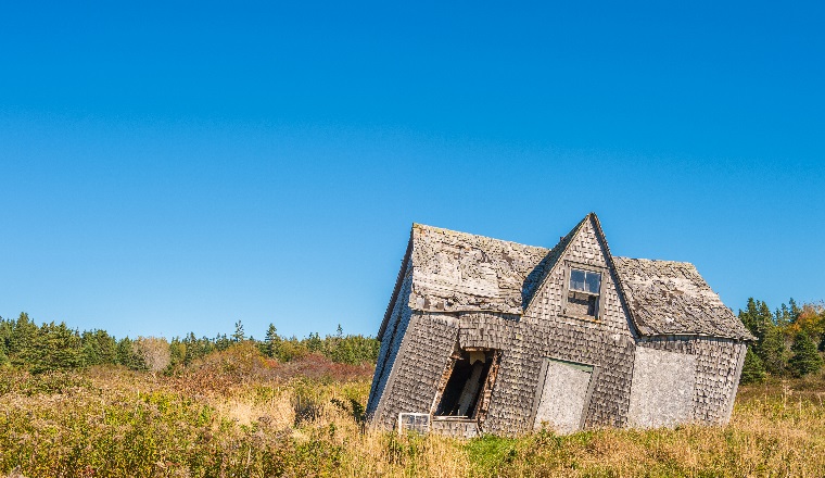 crooked leaning old house