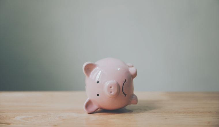 Piggy bank on wood table. Financial investment and save money concept