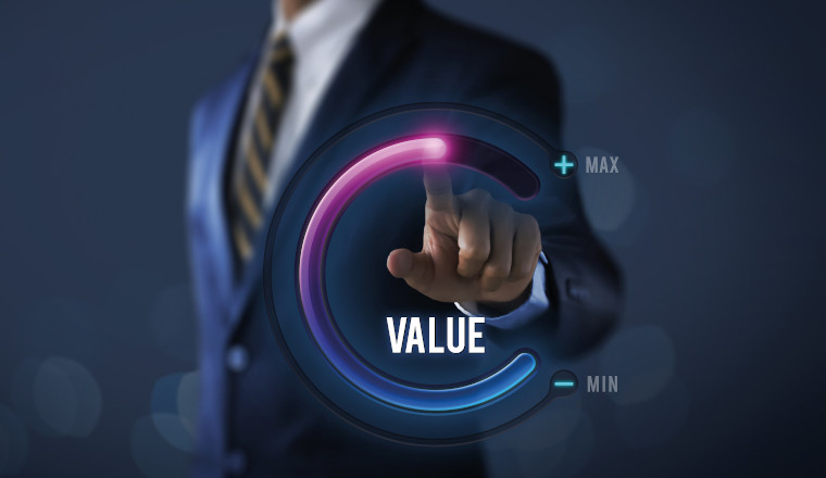 Growth value, increase value, value added or business growth concept. Businessman is pulling up circle progress bar with the word VALUE on dark tone background.