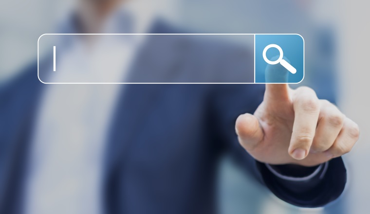 Search button on virtual screen pressed with finger