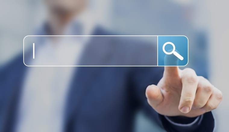 Search button on virtual screen pressed with finger