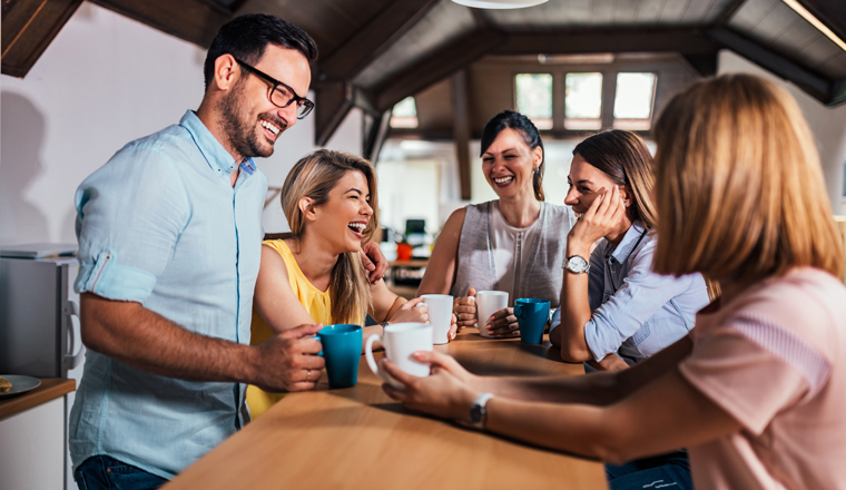 Laughing at coffee break.