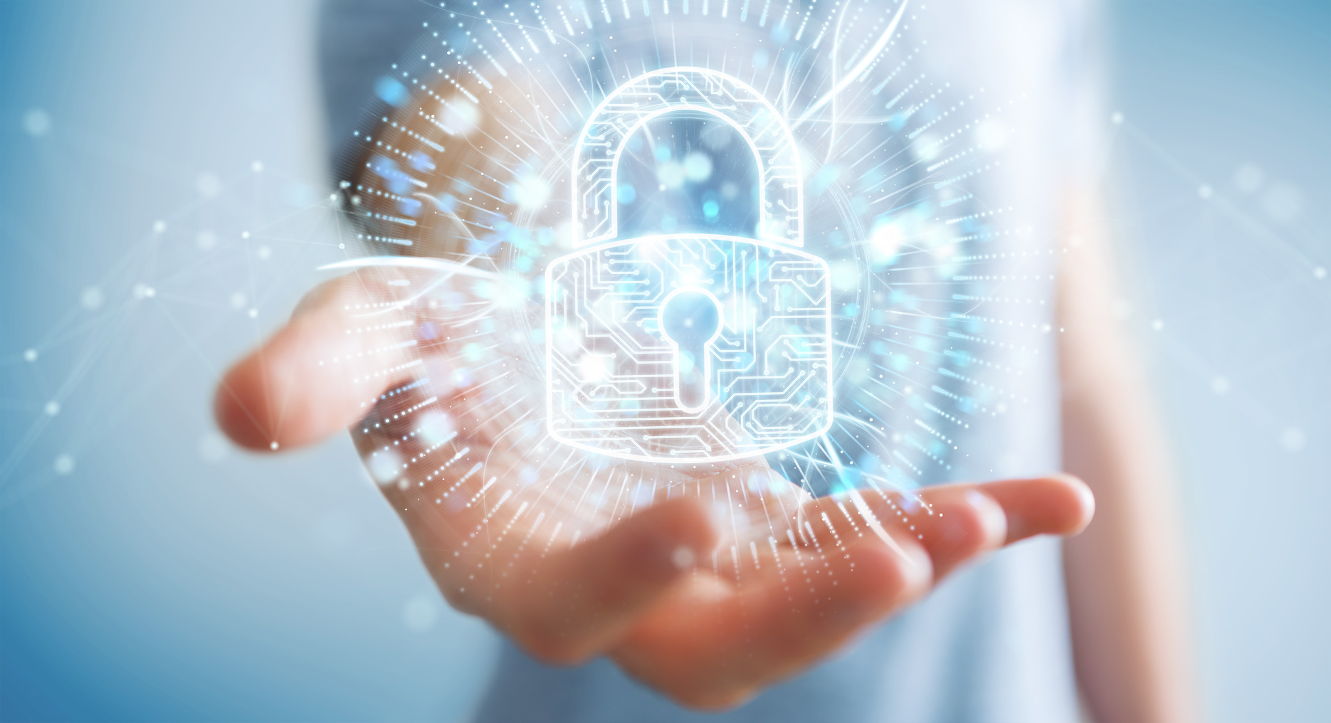 Businessman on blurred background protecting his datas with digital security hologram 3D rendering