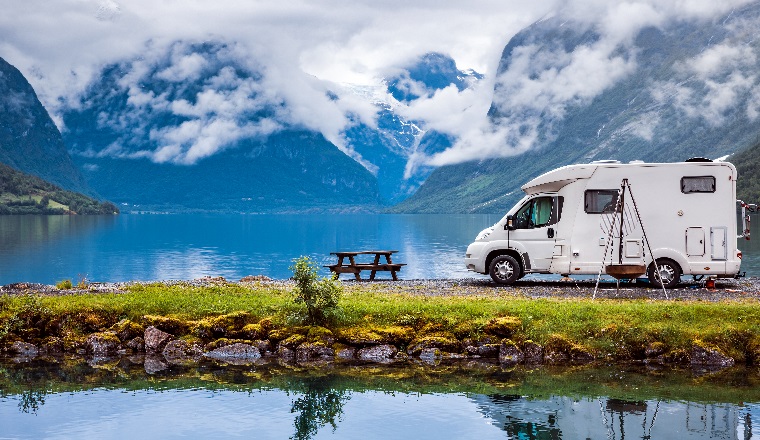 Family vacation travel RV, holiday trip in motorhome, Caravan car Vacation. Beautiful Nature Norway natural landscape.