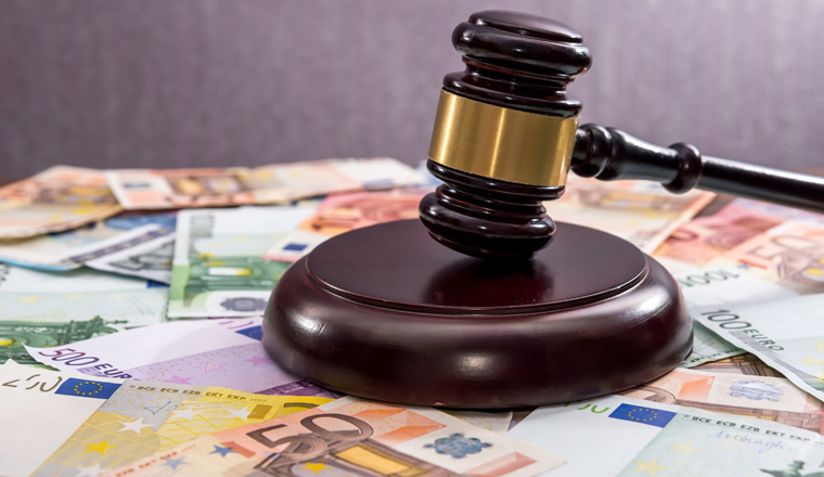 Judge's hammer with  Euro currency