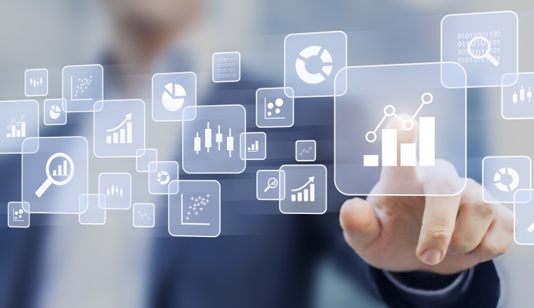 Big data analytics and business intelligence (BI) concept with chart and graph icons on a digital screen interface and a businessman in background