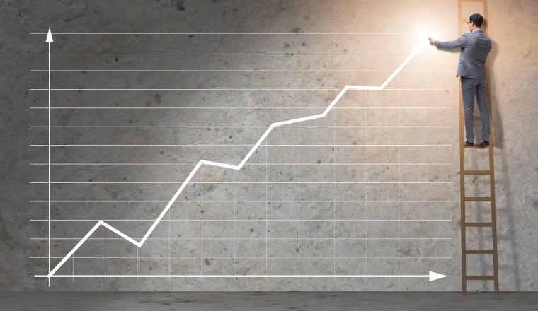 Young businessman facilitating economic growth concept