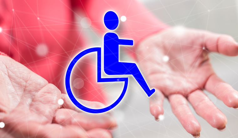 Disability insurance concept above the hands of a woman in background