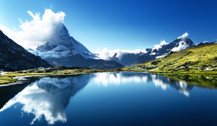 Reflection of Matterhorn in lake Riffelsee, Zermatt, Switzerland