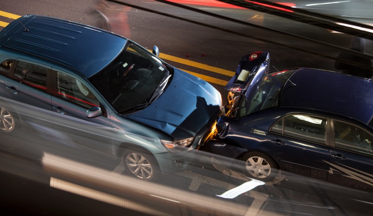 Overhead view of a car accident on a busy street