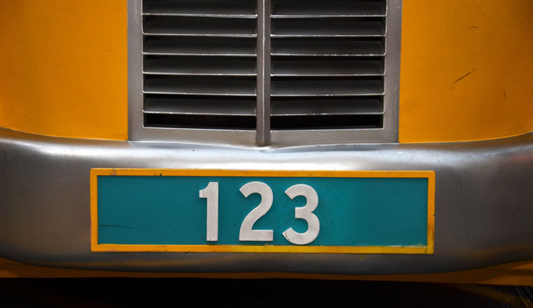 Number plate with 123 number on green background